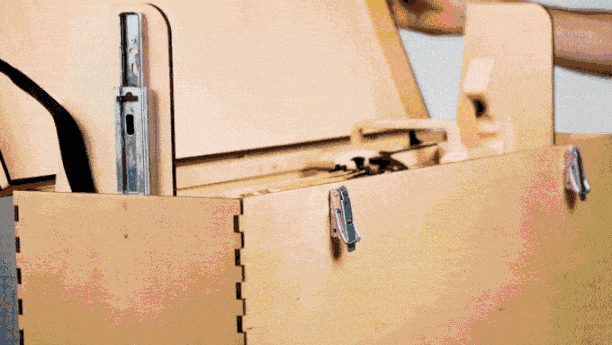 weaponized t rex wooden rubber band minigun