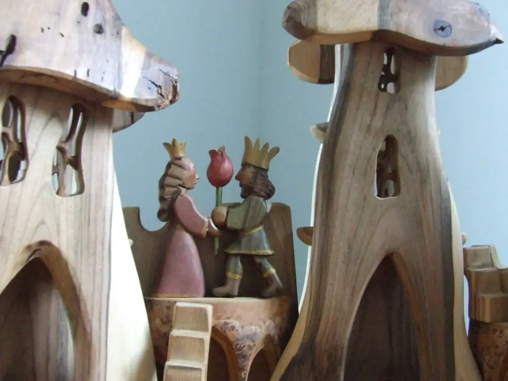 Davids wood store king and queen wooden castle figurines.