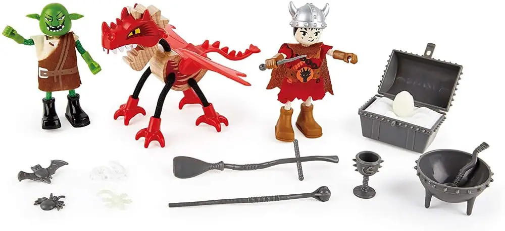 Hape Toys brand wooden figurines: ogre, dragon, and warrior.