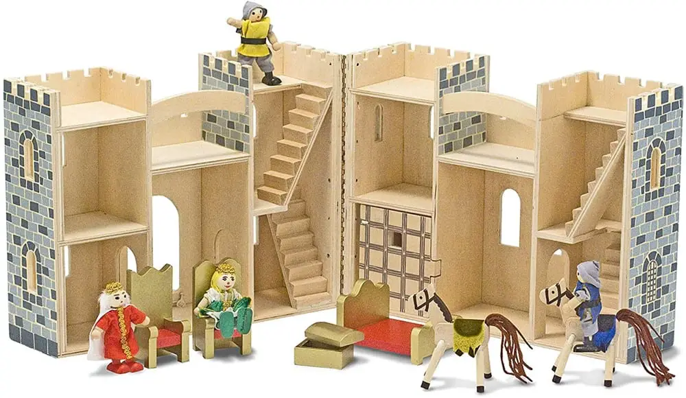 Melissa & Doug brand wooden castle unfolded displaying interior rooms.