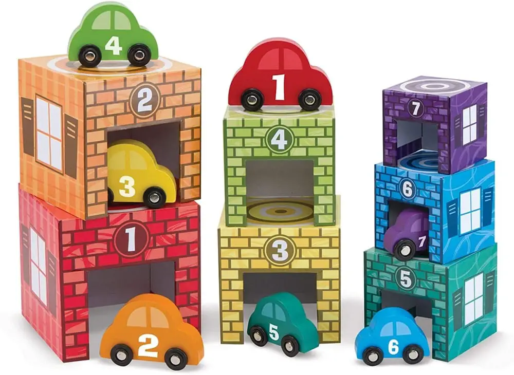 Melissa & Doug brand nesting sorting wooden garages and cars.