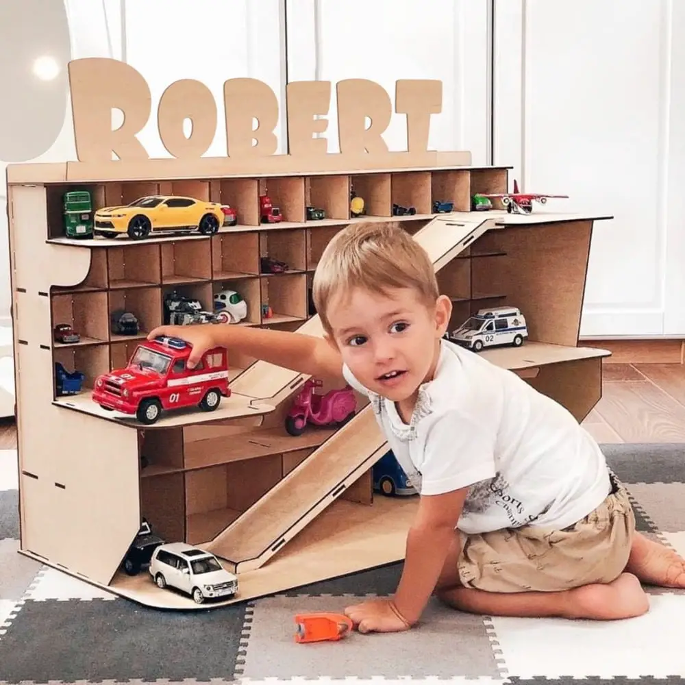 Toy Box Addicted brand custom name wooden car storage garage with name "Robert".